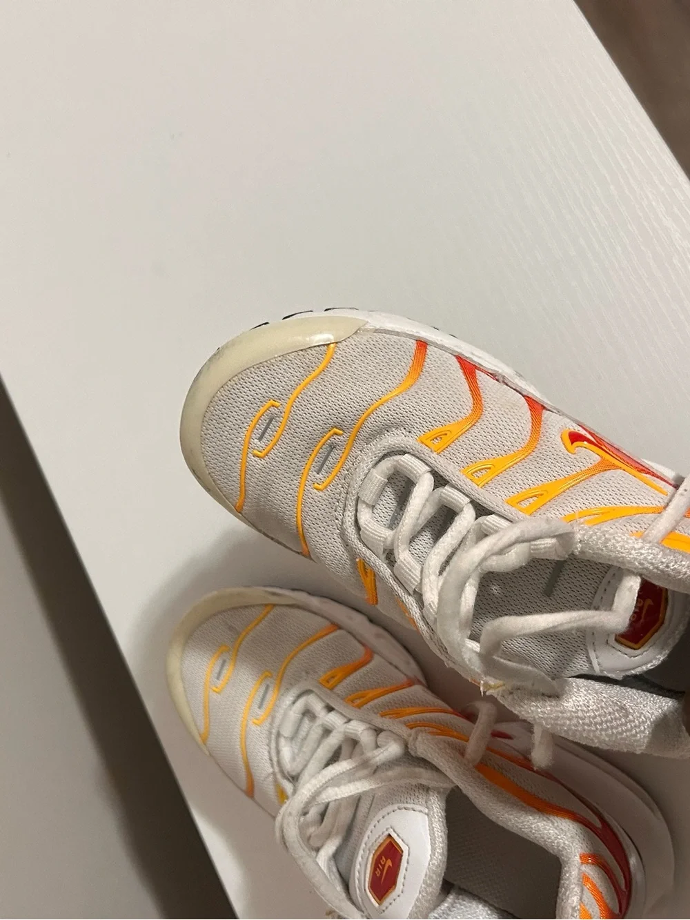 Nike Kids White Sneakers with Orange Trim